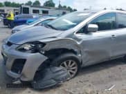 ✅ 2011 Mazda CX-7 i Sport • VIN: JM3ER2B54B0408253 • Lot: 42705396. Wystawiony na IAAI z przebiegiem 138 875 mil. Bezpłatny archiwum sprzedaży aukcyjnych z USA i szczegółowy raport historii pojazdu na DreamBid. Zdjęcie 6.