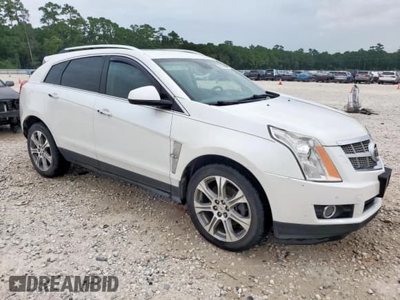 ✅ 2012 Cadillac SRX Premium Collection • VIN: 3GYFNFE35CS578474 • Lot: 65536115. Listed on Copart with 200,004 mi. Free auction sales archive from the USA and detailed vehicle history report at DreamBid. Image 4.