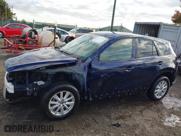 ✅ 2014 Mazda CX-5 Touring • VIN: JM3KE2CY8E0370523 • Lot: 43547270. Listed on IAAI with 111,517 mi. Free auction sales archive from the USA and detailed vehicle history report at DreamBid. Image 15.