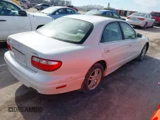 ✅ 1999 Mazda Millenia • VIN: JM1TA2214X1502235 • Lot: 41476231. Wystawiony na IAAI z przebiegiem 201 158 mil. Bezpłatny archiwum sprzedaży aukcyjnych z USA i szczegółowy raport historii pojazdu na DreamBid. Zdjęcie 4.