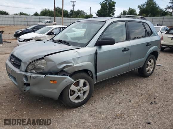 2007 Hyundai Tucson GLS with VIN KM8JM12B27U495748, listed as a Copart auction lot 65995374 with 203,456 mi miles and Salvage title. Bid and sale history available at DreamBid. Image 1.