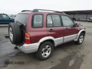 ✅ 2000 Suzuki Grand Vitara JLX • VIN: JS3TD62V9Y4112122 • Lot: 43838714. Listed on IAAI with Not provided. Free auction sales archive from the USA and detailed vehicle history report at DreamBid. Image 4.