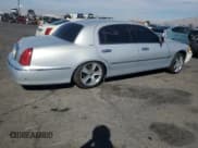 ✅ 2000 Lincoln Town Car Executive • VIN: 1LNHM81W9YY908643 • Lot: 68047715. Listed on Copart with 129,499 mi. Free auction sales archive from the USA and detailed vehicle history report at DreamBid. Image 3.