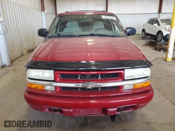 2003 Chevrolet Blazer LS z VIN 1GNCT18X13K165163, wystawiony jako Copart lot #78693034 z przebiegiem 159 770 mil mil oraz Szkoda całkowita • Salvage title. Historia ofert i sprzedaży dostępna na DreamBid. Obrazek 5.