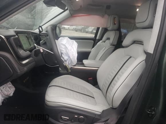 ✅ 2023 Rivian R1S Adventure • VIN: 7PDSGABA0PN005253 • Lot: 89906395. Listed on Copart with 51,472 mi. Free auction sales archive from the USA and detailed vehicle history report at DreamBid. Image 7.