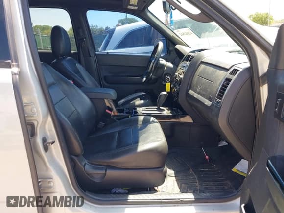 ✅ 2009 Ford Escape Limited • VIN: 1FMCU04G79KB35059 • Lot: 42302842. Listed on IAAI with 248,440 mi. Free auction sales archive from the USA and detailed vehicle history report at DreamBid. Image 5.