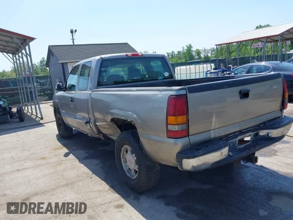 ✅ 2001 GMC Sierra 1500 SLE • VIN: 1GTEK19T31E271805 • Лот: 42167399. Опубликован ранее на IAAI с пробегом 206 202 миль. Бесплатный доступ к архиву аукционных продаж из США и подробный отчёт об истории автомобиля на DreamBid. Изображение 3.