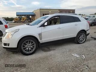 ✅ 2013 Cadillac SRX Premium Collection • VIN: 3GYFNJE34DS655758 • Lot: 82406165. Wystawiony na Copart z przebiegiem 159 256 mil. Bezpłatny archiwum sprzedaży aukcyjnych z USA i szczegółowy raport historii pojazdu na DreamBid. Zdjęcie 1.