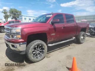 2014 Chevrolet Silverado 1500 LT с VIN 3GCUKRECXEG391423, выставлен на аукционе Copart как лот 70221575 с пробегом 143 356 миль миль и Списание • Salvage title. История ставок и продаж доступна на DreamBid. Изображение 1.