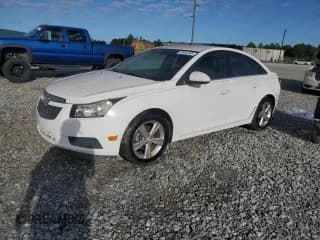 ✅ 2013 Chevrolet Cruze 2LT • VIN: 1G1PE5SB2D7134526 • Lot: 86442365. Listed on Copart with 180,613 mi. Free auction sales archive from the USA and detailed vehicle history report at DreamBid. Image 1.