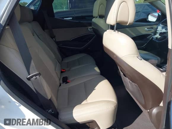 2016 Hyundai Santa Fe z VIN 5XYZU3LB5GG352375, wystawiony jako IAAI lot #43275296 z przebiegiem 161 689 mil mil oraz . Historia ofert i sprzedaży dostępna na DreamBid. Obrazek 8.