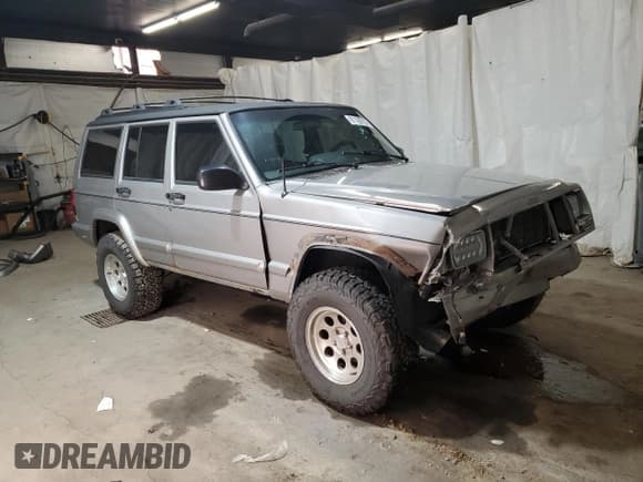 ✅ 2001 Jeep Cherokee Sport • VIN: 1J4FF58S11L549406 • Lot: 91100755. Listed on Copart with 145,496 mi. Free auction sales archive from the USA and detailed vehicle history report at DreamBid. Image 4.