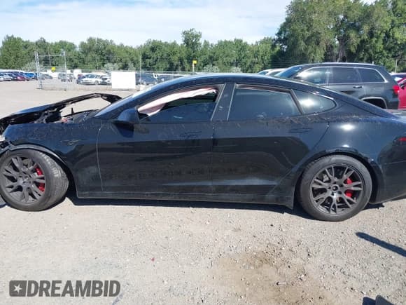 ✅ 2024 Tesla Model S Plaid • VIN: 5YJSA1E64RF533525 • Lot: 42922540. Listed on IAAI with Not provided. Free auction sales archive from the USA and detailed vehicle history report at DreamBid. Image 15.