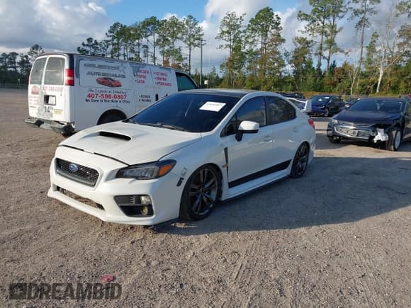 ✅ 2016 Subaru WRX • VIN: JF1VA1B64G9816327 • Lot: 43655907. Listed on IAAI with 100,580 mi. Free auction sales archive from the USA and detailed vehicle history report at DreamBid. Image 2.