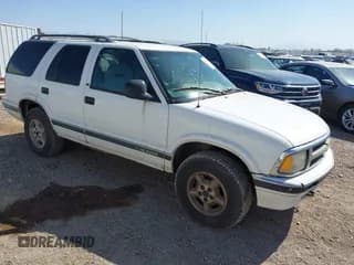 ✅ 1997 Chevrolet Blazer LS • VIN: 1GNDT13W3V2249863 • Lot: 41987154. Wystawiony na IAAI z przebiegiem 249 961 mil. Bezpłatny archiwum sprzedaży aukcyjnych z USA i szczegółowy raport historii pojazdu na DreamBid. Zdjęcie 1.