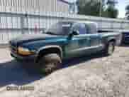 1998 Dodge Dakota SLT with VIN 1B7GL22X2WS753537, listed as a Copart auction lot 75964034 with 161,848 mi miles and Salvage title. Bid and sale history available at DreamBid. Image 1.
