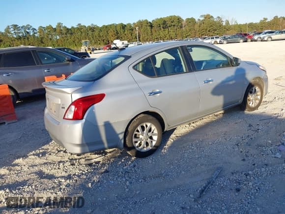 ✅ 2018 Nissan Versa SV • VIN: 3N1CN7AP6JL869549 • Lot: 43770421. Listed on IAAI with 161,318 mi. Free auction sales archive from the USA and detailed vehicle history report at DreamBid. Image 4.