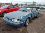 ✅ 1993 Ford Mustang • VIN: 1FACP44M3PF212921 • Lot: 42337259. Listed on IAAI with 11,452 mi. Free auction sales archive from the USA and detailed vehicle history report at DreamBid. Image 2.