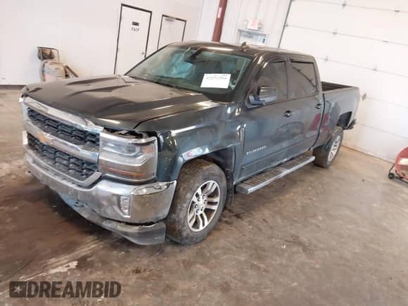 2018 Chevrolet Silverado 1500 LT z VIN 3GCUKREC0JG519095, wystawiony jako IAAI lot #43271594 z przebiegiem 108 548 mil mil oraz . Historia ofert i sprzedaży dostępna na DreamBid. Obrazek 17.