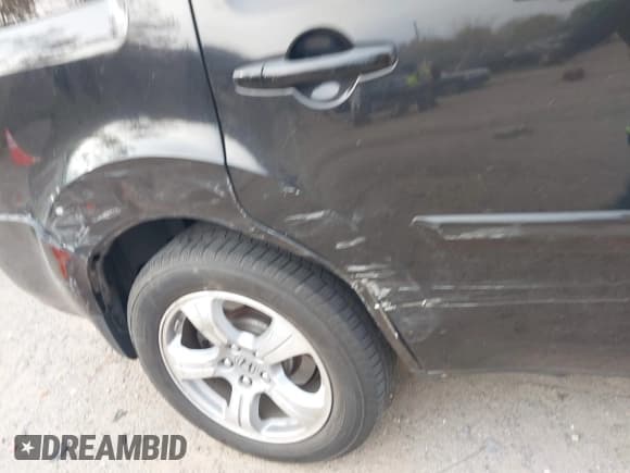 ✅ 2015 Honda Pilot EX-L • VIN: 5FNYF3H51FB031948 • Lot: 43634357. Listed on IAAI with 150,807 mi. Free auction sales archive from the USA and detailed vehicle history report at DreamBid. Image 6.