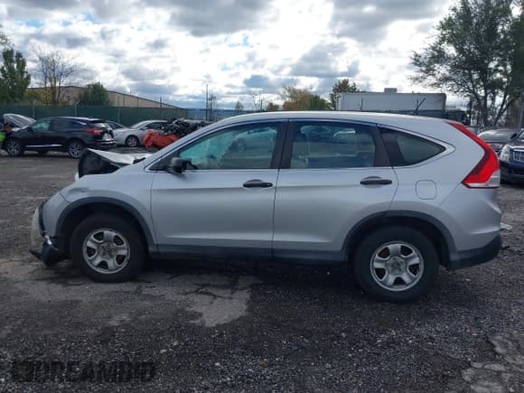 ✅ 2014 Honda CR-V LX • VIN: 2HKRM4H35EH604896 • Lot: 43590334. Listed on IAAI with 114,073 mi. Free auction sales archive from the USA and detailed vehicle history report at DreamBid. Image 14.