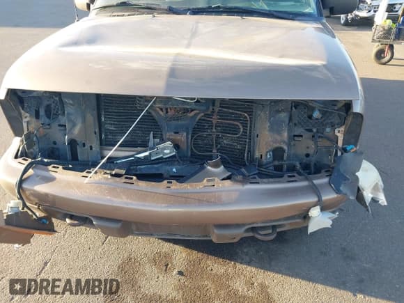 ✅ 2004 Chevrolet Blazer LS • VIN: 1GNDT13X74K143228 • Lot: 41761295. Wystawiony na IAAI z przebiegiem 149 003 mil. Bezpłatny archiwum sprzedaży aukcyjnych z USA i szczegółowy raport historii pojazdu na DreamBid. Zdjęcie 6.