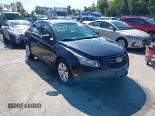 ✅ 2012 Chevrolet Cruze LS • VIN: 1G1PD5SH0C7103586 • Lot: 43312571. Listed on IAAI with 157,108 mi. Free auction sales archive from the USA and detailed vehicle history report at DreamBid. Image 1.
