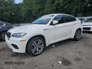 ✅ 2012 BMW X6 M • VIN: 5YMGZ0C56CLL29517 • Lot: 67070425. Wystawiony na Copart z przebiegiem 151 293 mil. Bezpłatny archiwum sprzedaży aukcyjnych z USA i szczegółowy raport historii pojazdu na DreamBid. Zdjęcie 1.