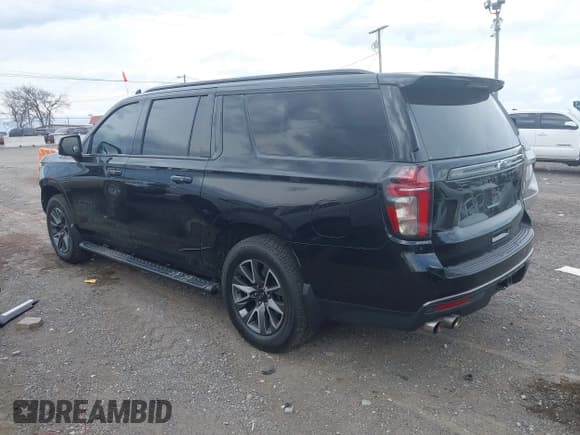 ✅ 2022 Chevrolet Suburban • VIN: 1GNSKDKL5NR218592 • Lot: 41989302. Listed on IAAI with 184,080 mi. Free auction sales archive from the USA and detailed vehicle history report at DreamBid. Image 14.