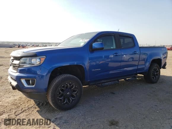 ✅ 2018 Chevrolet Colorado 4WD Z71 • VIN: 1GCGTDEN6J1129292 • Лот: 71525274. Опубликован ранее на Copart с пробегом 76 524 миль. Бесплатный доступ к архиву аукционных продаж из США и подробный отчёт об истории автомобиля на DreamBid. Изображение 1.
