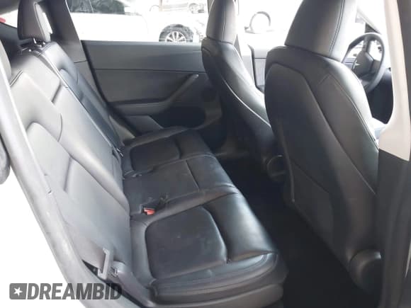 ✅ 2023 Tesla Model Y Long Range • VIN: 7SAYGAEE0PF787216 • Lot: 41589954. Listed on IAAI with 17,985 mi. Free auction sales archive from the USA and detailed vehicle history report at DreamBid. Image 8.