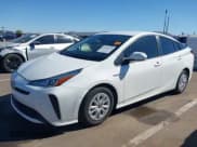 ✅ 2022 Toyota Prius L Eco • VIN: JTDKAMFU4N3159553 • Lot: 43496255. Listed on IAAI with 72,455 mi. Free auction sales archive from the USA and detailed vehicle history report at DreamBid. Image 2.