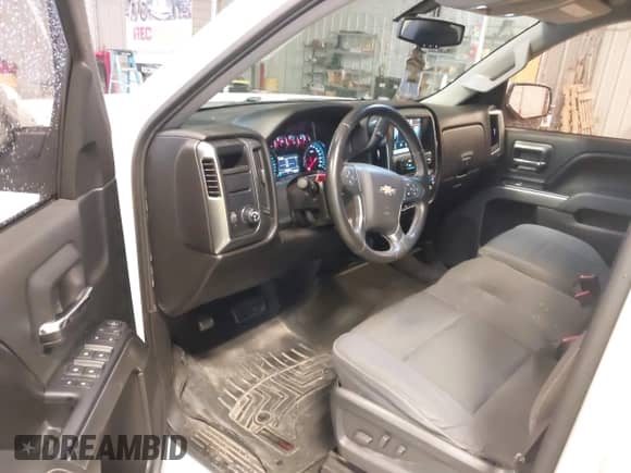 2015 Chevrolet Silverado 1500 LT z VIN 1GCRCREH0FZ398560, wystawiony jako IAAI lot #42454940 z przebiegiem 158 025 mil mil oraz . Historia ofert i sprzedaży dostępna na DreamBid. Obrazek 19.