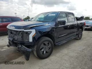 ✅ 2023 Ford F-150 Lightning Pro • VIN: 1FT6W1EV5PWG05271 • Лот: 82040715. Опубликован ранее на Copart с пробегом Не указан. Бесплатный доступ к архиву аукционных продаж из США и подробный отчёт об истории автомобиля на DreamBid. Изображение 1.