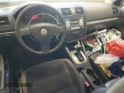 ✅ 2009 Volkswagen Jetta S • VIN: 3VWJZ71K99M010312 • Лот: 84917885. Опубликован ранее на Copart с пробегом 142 057 миль. Бесплатный доступ к архиву аукционных продаж из США и подробный отчёт об истории автомобиля на DreamBid. Изображение 8.