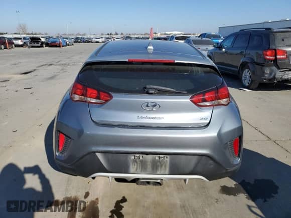 2019 Hyundai Veloster Premium z VIN KMHTG6AF4KU018376, wystawiony jako Copart lot #42489705 z przebiegiem 87 399 mil mil oraz Czysty tytuł • Clean title. Historia ofert i sprzedaży dostępna na DreamBid. Obrazek 6.