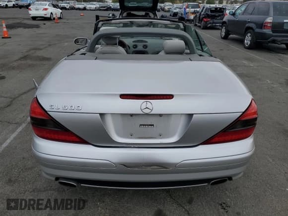 ✅ 2005 Mercedes-Benz SL 500 • VIN: WDBSK75F05F091086 • Lot: 84013865. Listed on Copart with 119,950 mi. Free auction sales archive from the USA and detailed vehicle history report at DreamBid. Image 6.