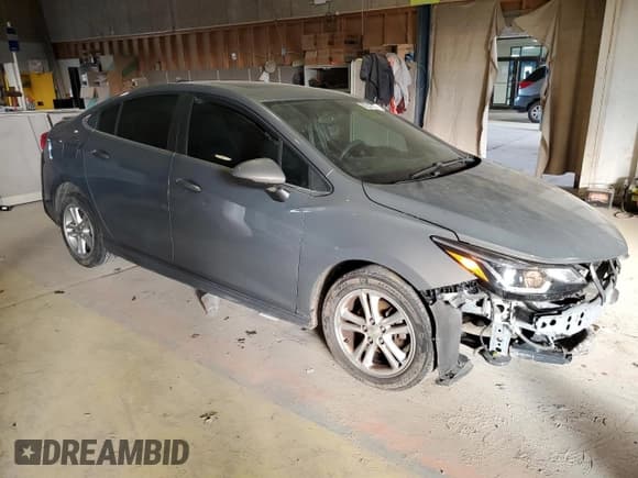 ✅ 2017 Chevrolet Cruze LT • VIN: 1G1BE5SMXH7222435 • Lot: 69386522. Listed on Copart with 98,817 mi. Free auction sales archive from the USA and detailed vehicle history report at DreamBid. Image 4.