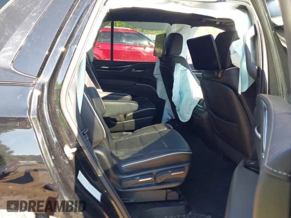 ✅ 2023 Cadillac Escalade 4WD Sport • VIN: 1GYS4EKL1PR484665 • Лот: 42658662. Опубликован ранее на IAAI с пробегом 45 772 миль. Бесплатный доступ к архиву аукционных продаж из США и подробный отчёт об истории автомобиля на DreamBid. Изображение 8.