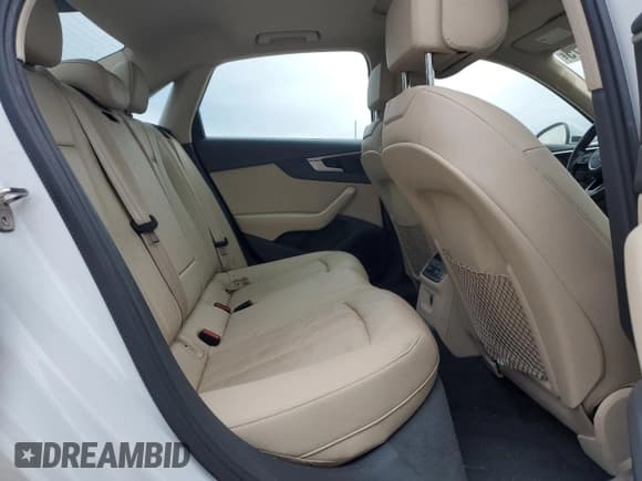 ✅ 2018 Audi A4 Premium Plus • VIN: WAUENAF41JA012853 • Лот: 93243475. Опубликован ранее на Copart с пробегом 99 717 миль. Бесплатный доступ к архиву аукционных продаж из США и подробный отчёт об истории автомобиля на DreamBid. Изображение 10.