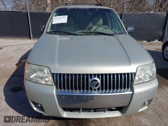 2005 Mercury Mariner Luxury z VIN 4M2YU56125DJ05993, wystawiony jako IAAI lot #41745773 z przebiegiem 265 895 mil mil oraz . Historia ofert i sprzedaży dostępna na DreamBid. Obrazek 6.