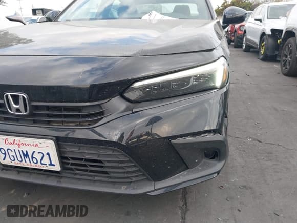 ✅ 2023 Honda Civic Sport • VIN: 2HGFE2F57PH557229 • Lot: 43693355. Listed on IAAI with 22,110 mi. Free auction sales archive from the USA and detailed vehicle history report at DreamBid. Image 18.