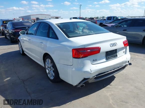✅ 2014 Audi A6 Prestige • VIN: WAUHMAFC8EN115466 • Лот: 43662078. Опубликован ранее на IAAI с пробегом 134 603 миль. Бесплатный доступ к архиву аукционных продаж из США и подробный отчёт об истории автомобиля на DreamBid. Изображение 3.