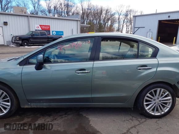 ✅ 2014 Subaru Impreza Limited • VIN: JF1GJAG67EH022748 • Лот: 41590789. Опубликован ранее на IAAI с пробегом 88 156 миль. Бесплатный доступ к архиву аукционных продаж из США и подробный отчёт об истории автомобиля на DreamBid. Изображение 15.