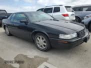 ✅ 2002 Cadillac Eldorado Touring • VIN: 1G6ET12912B102383 • Лот: 75119604. Опубликован ранее на Copart с пробегом Не указан. Бесплатный доступ к архиву аукционных продаж из США и подробный отчёт об истории автомобиля на DreamBid. Изображение 4.