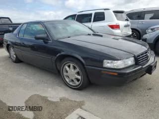 ✅ 2002 Cadillac Eldorado Touring • VIN: 1G6ET12912B102383 • Лот: 75119604. Опубликован ранее на Copart с пробегом Не указан. Бесплатный доступ к архиву аукционных продаж из США и подробный отчёт об истории автомобиля на DreamBid. Изображение 4.