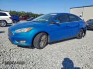 ✅ 2015 Ford Focus Titanium • VIN: 1FADP3J25FL229611 • Lot: 94754285. Listed on Copart with 90,630 mi. Free auction sales archive from the USA and detailed vehicle history report at DreamBid. Image 1.