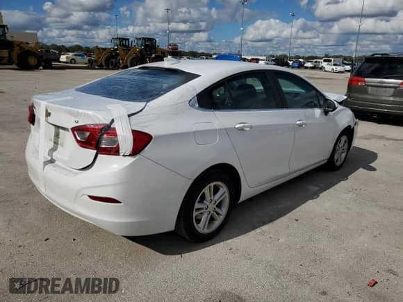 2018 Chevrolet Cruze LT z VIN 1G1BE5SM0J7246944, wystawiony jako Copart lot #70740502 z przebiegiem 73 133 mil mil oraz . Historia ofert i sprzedaży dostępna na DreamBid. Obrazek 3.