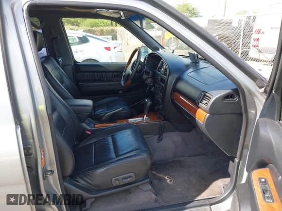 ✅ 2001 Infiniti QX4 Luxury • VIN: JNRDR09X71W201108 • Лот: 43045459. Опубликован ранее на IAAI с пробегом 209 175 миль. Бесплатный доступ к архиву аукционных продаж из США и подробный отчёт об истории автомобиля на DreamBid. Изображение 5.