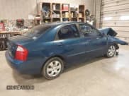 ✅ 2004 Kia Spectra LX • VIN: KNAFE121145012249 • Lot: 42032571. Listed on IAAI with 146,748 mi. Free auction sales archive from the USA and detailed vehicle history report at DreamBid. Image 4.